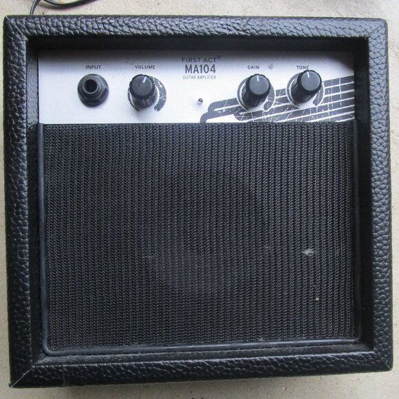 First Act's compact guitar practice amplifier sports a cool, rugged, retro desig - Picture 2 of 3